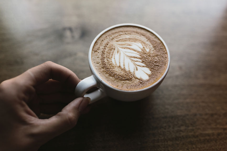 Complimentary coffee with leaf design at Niche 905